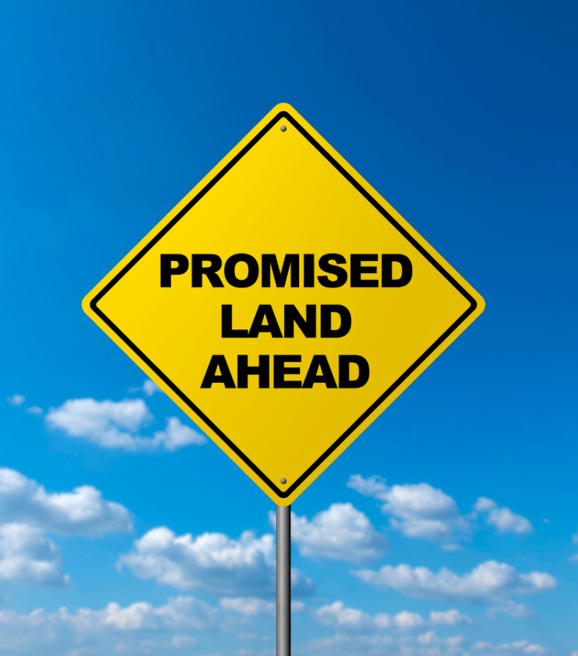 Promised land ahead sign board